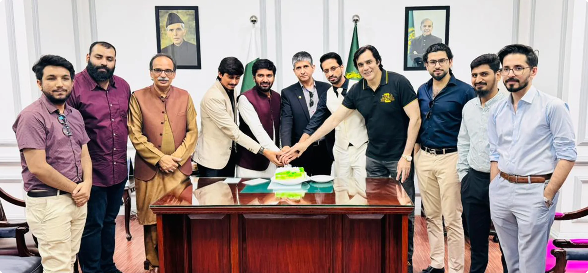 Cake cutting ceremony with government seniors